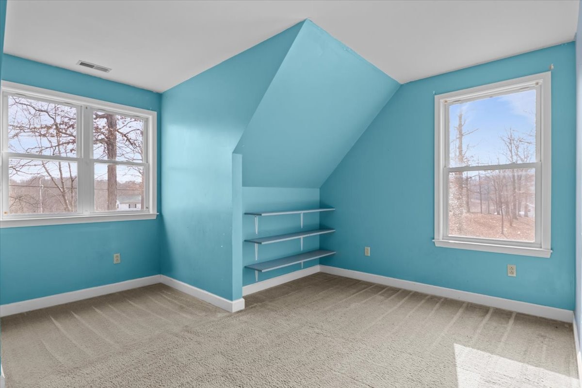 1077 Claylick Road White Bluff, TN 37187 - Photo 42 of 49 an empty room with windows and entryway