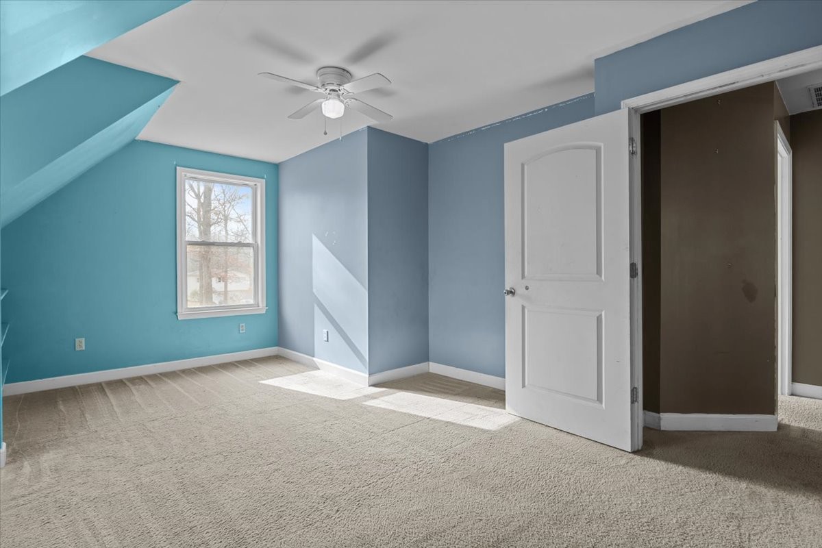 1077 Claylick Road White Bluff, TN 37187 - Photo 43 of 49 an empty room with windows and fan