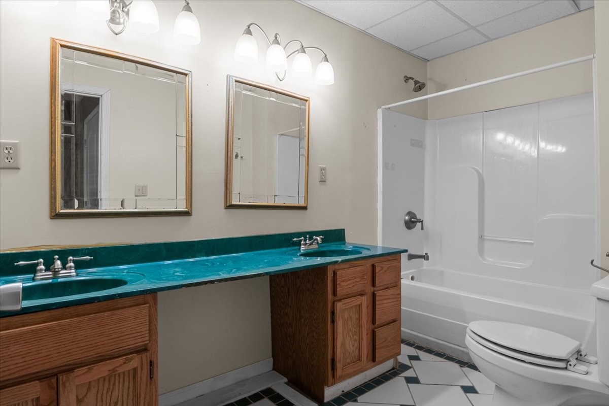 1077 Claylick Road White Bluff, TN 37187 - Photo 44 of 49 a bathroom with a toilet a sink and mirror