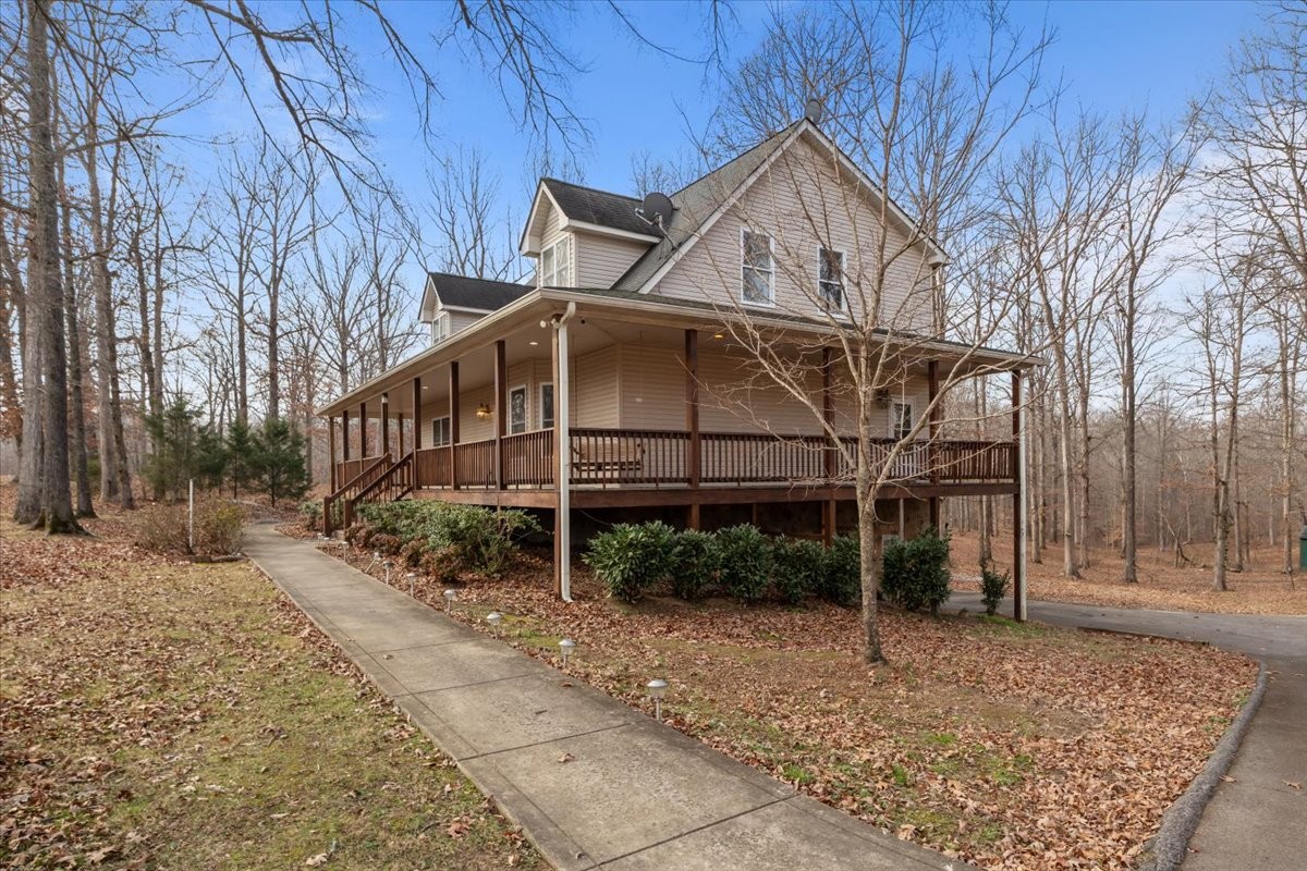 1077 Claylick Road White Bluff, TN 37187 - Photo 5 of 49 a house with trees in front of it