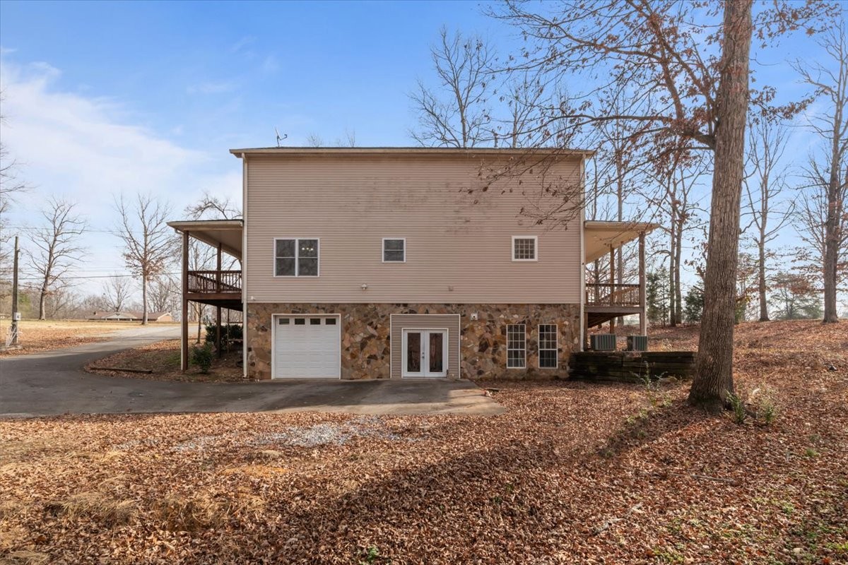1077 Claylick Road White Bluff, TN 37187 - Photo 8 of 49 a front view of a house with a yard