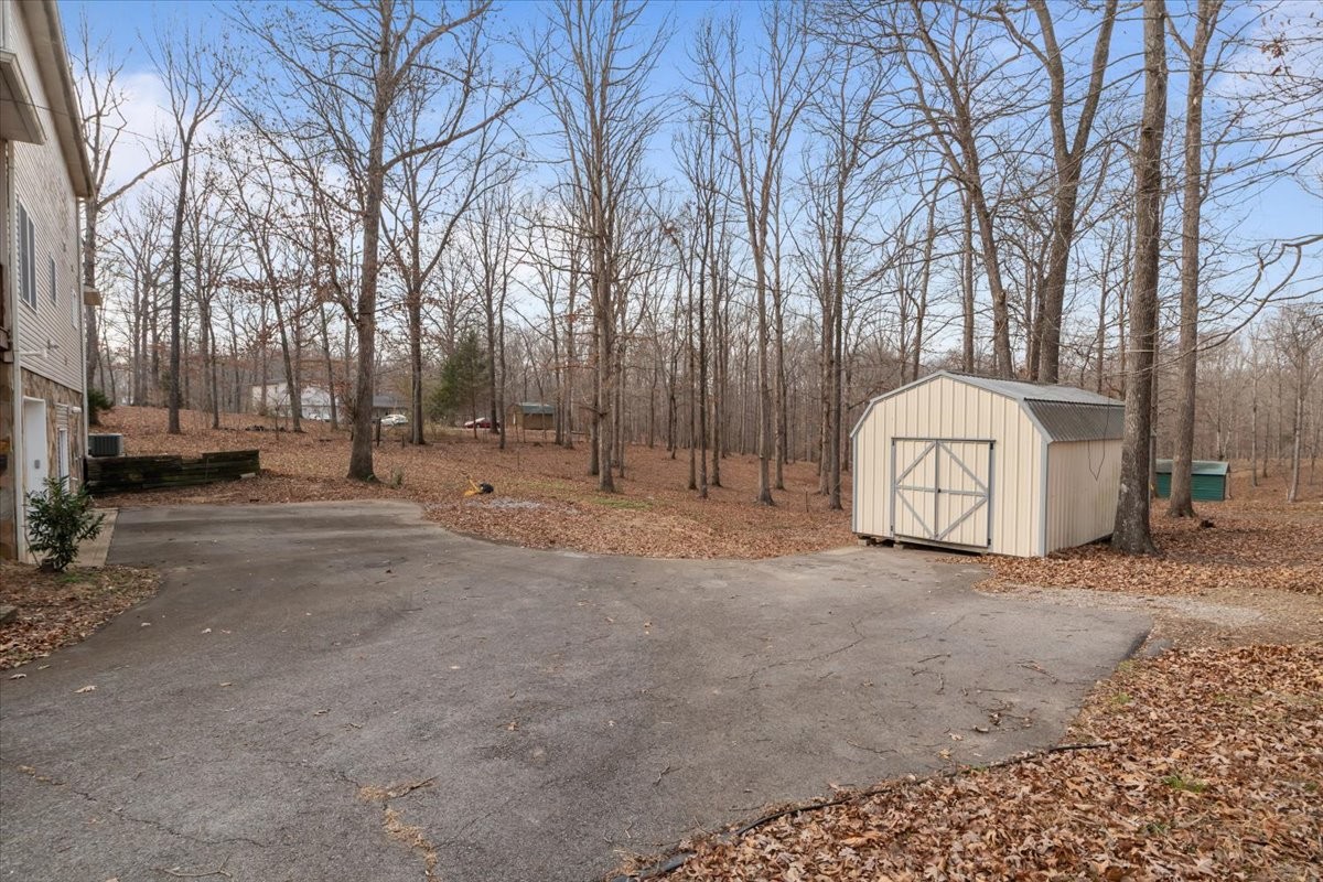 1077 Claylick Road White Bluff, TN 37187 - Photo 10 of 49 a view of a outdoor space with trees