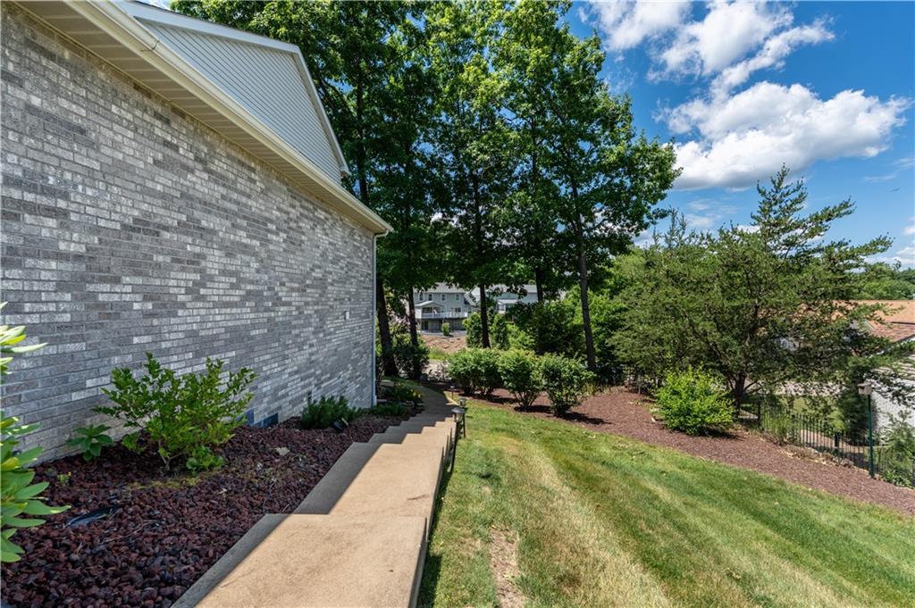 228 Country View Drive Lower Burrell, PA 15068 - Photo 40 of 49 a view of backyard with potted plants and large tree