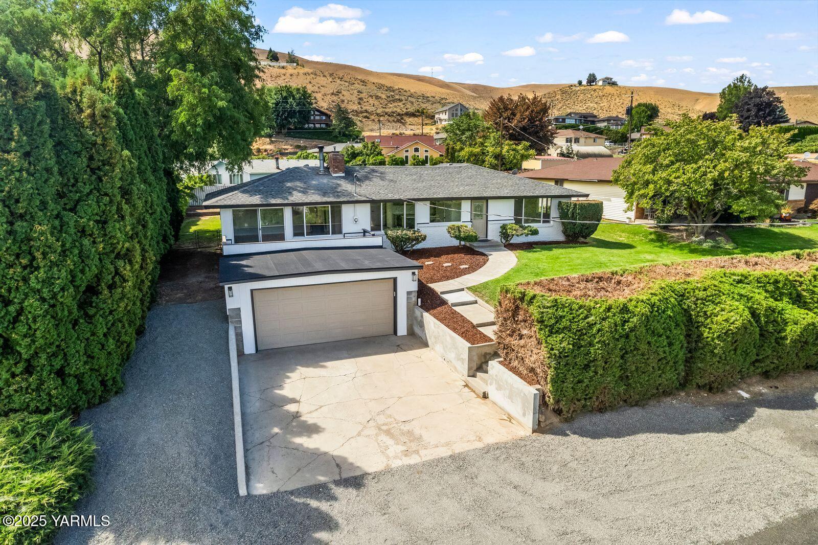 602 Meadowbrook Road Yakima, WA 98903 - Photo 5 of 42 aerial view of a house with yard and balcony
