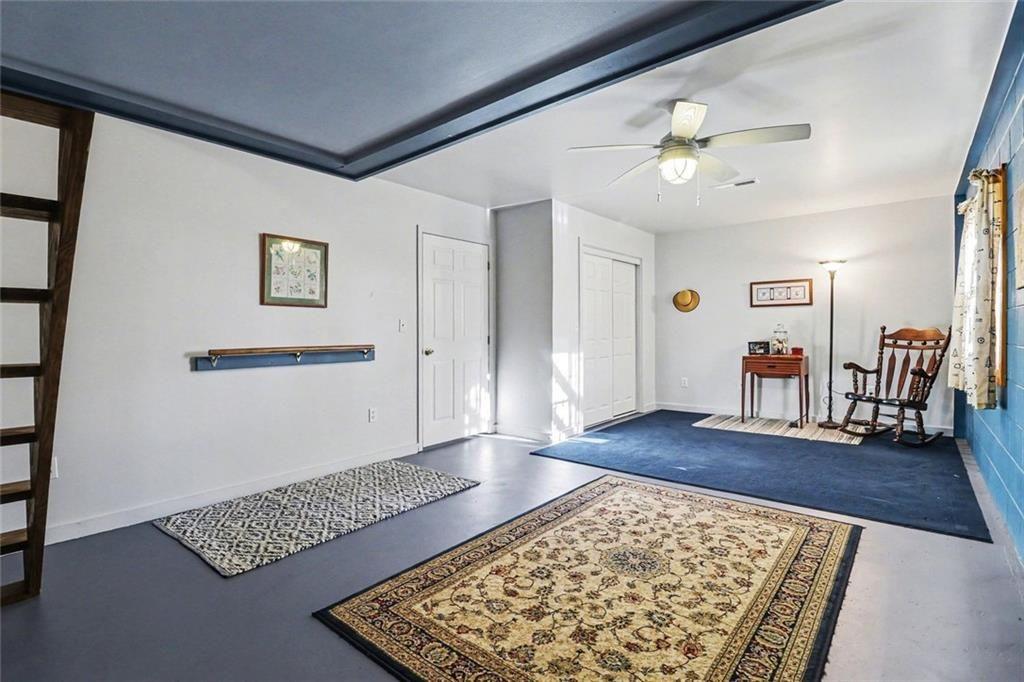 387 Ruby Lane Mineral Bluff, GA 30559 - Photo 19 of 29 wooden floor in an empty room with a window