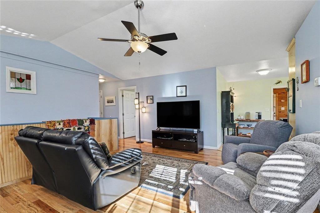 387 Ruby Lane Mineral Bluff, GA 30559 - Photo 6 of 29 a living room with furniture and a flat screen tv