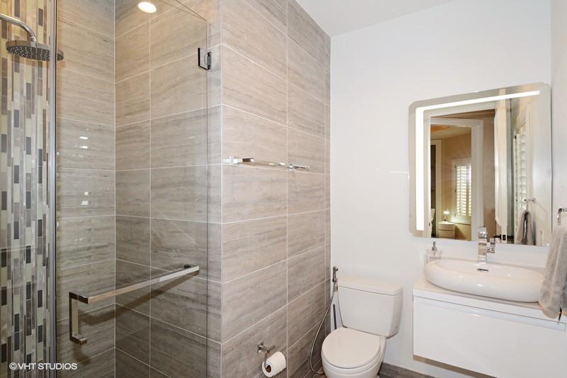 7257 Mandarin Drive Boca Raton, FL 33433 - Photo 11 of 35 a bathroom with a toilet sink and shower