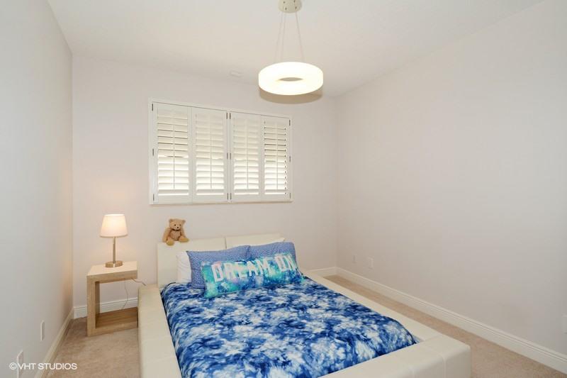 7257 Mandarin Drive Boca Raton, FL 33433 - Photo 18 of 35 a living room with a couch