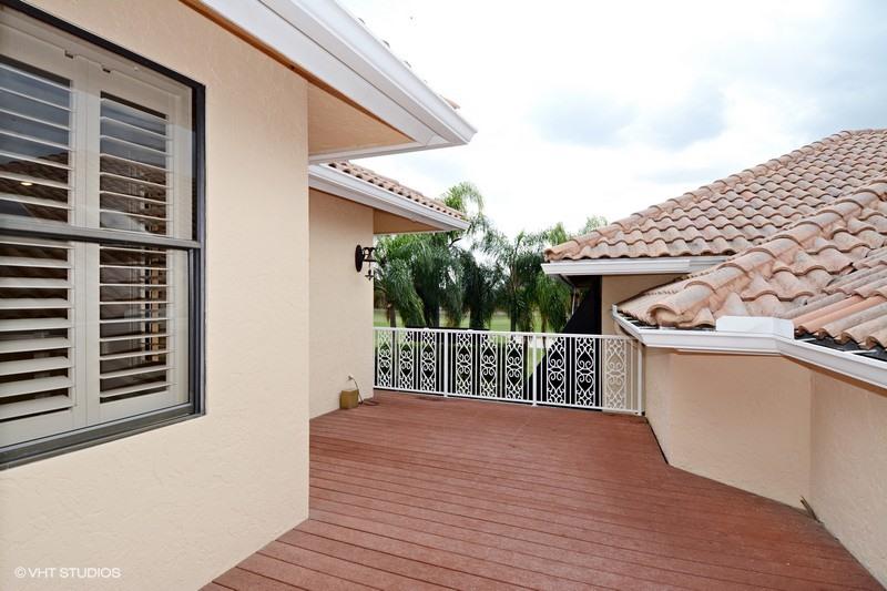 7257 Mandarin Drive Boca Raton, FL 33433 - Photo 21 of 35 a terrace with a chair and table