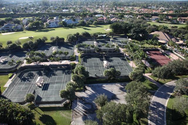 7257 Mandarin Drive Boca Raton, FL 33433 - Photo 30 of 35 an aerial view of residential houses with outdoor space