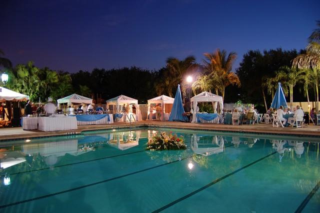 7257 Mandarin Drive Boca Raton, FL 33433 - Photo 33 of 35 a view of a swimming pool and a chairs