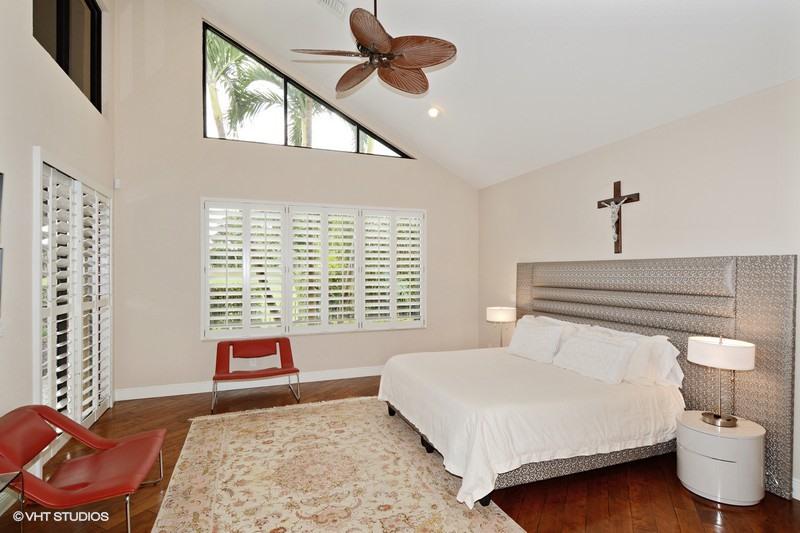 7257 Mandarin Drive Boca Raton, FL 33433 - Photo 7 of 35 a bedroom with a bed and window