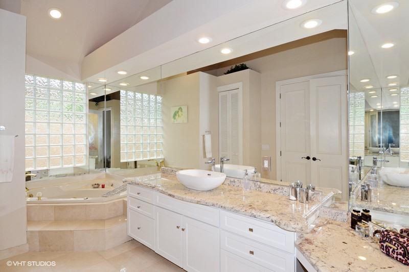 7257 Mandarin Drive Boca Raton, FL 33433 - Photo 8 of 35 a bathroom with a granite countertop sink and a bathtub