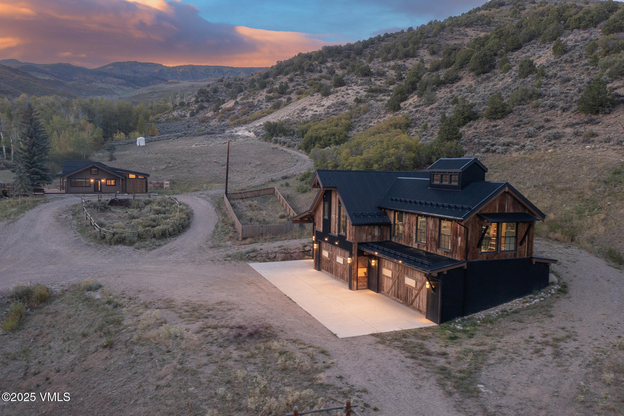 1500 West Sheep Creek Road Gypsum, CO 81637 - Photo 17 of 48 a view of a wooden house with a yard