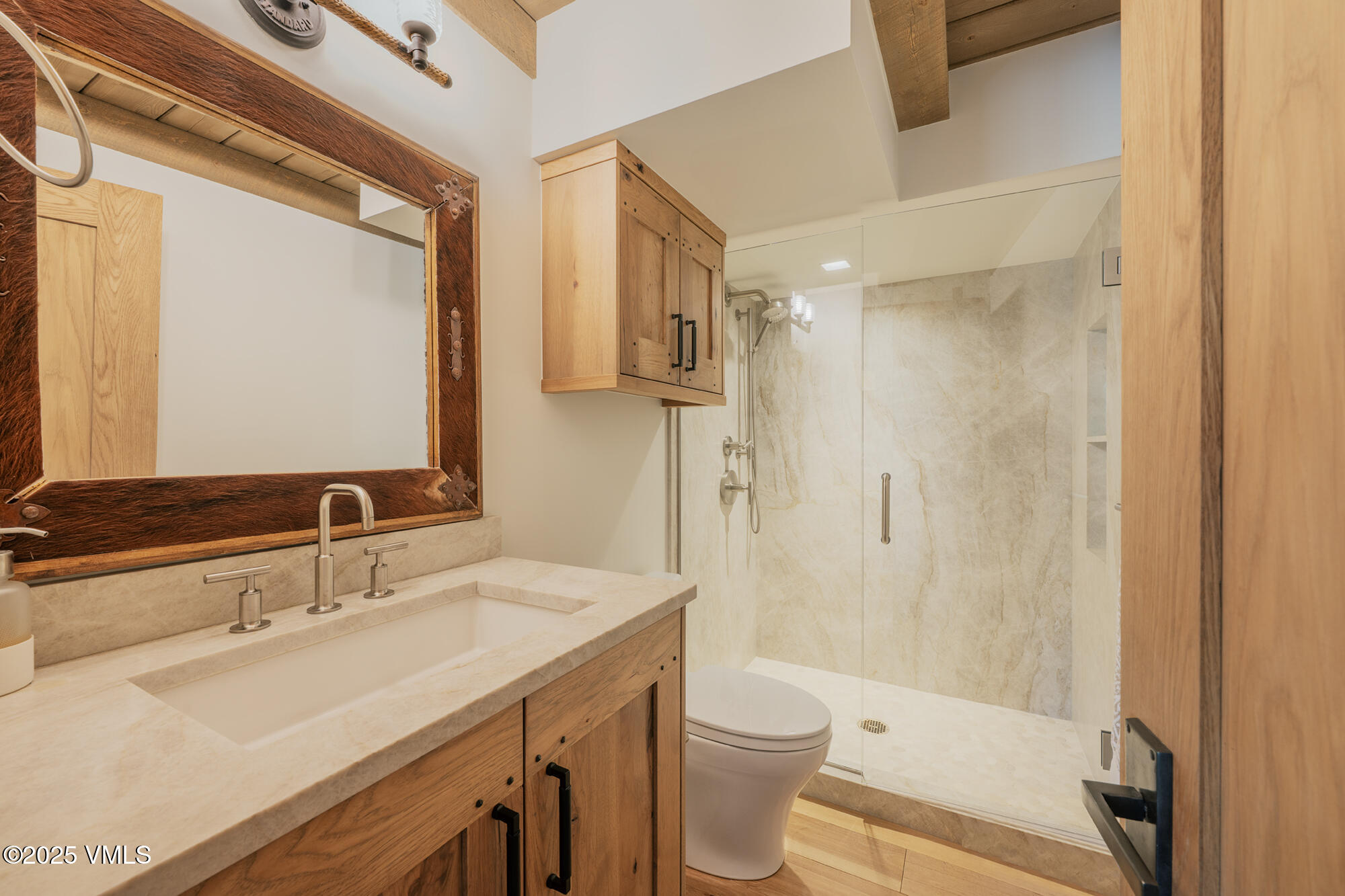 1500 West Sheep Creek Road Gypsum, CO 81637 - Photo 23 of 48 a bathroom with a sink a toilet and shower
