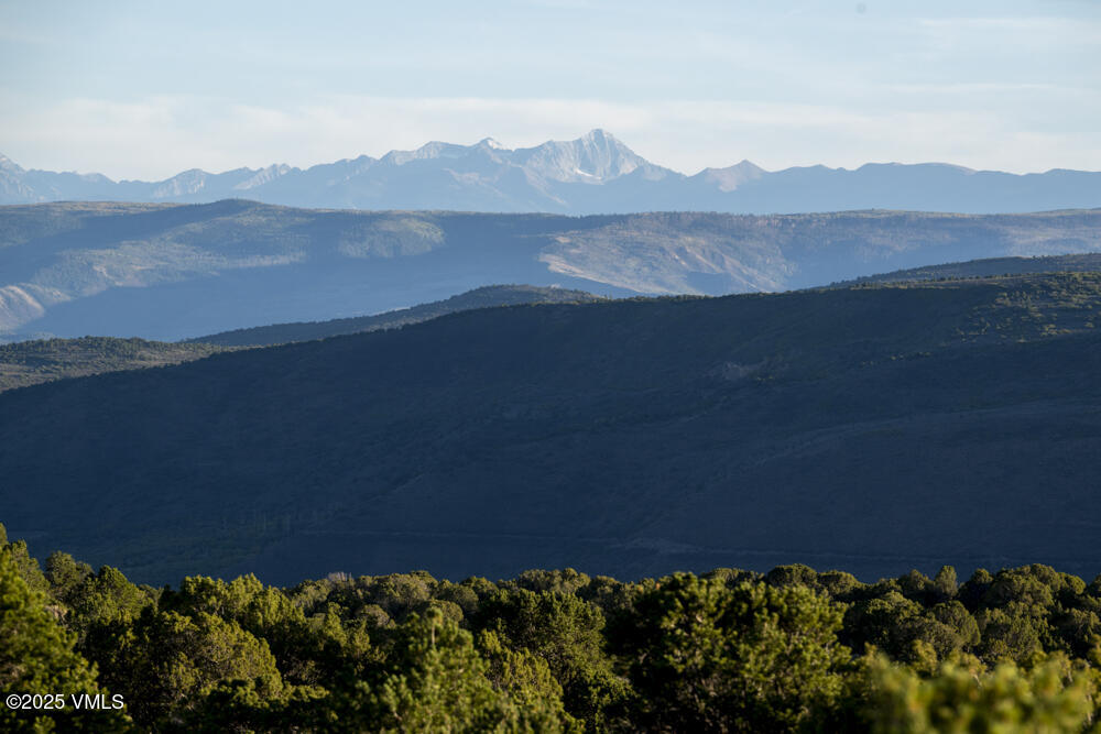 1500 West Sheep Creek Road Gypsum, CO 81637 - Photo 46 of 48 a view of a lake with a mountain