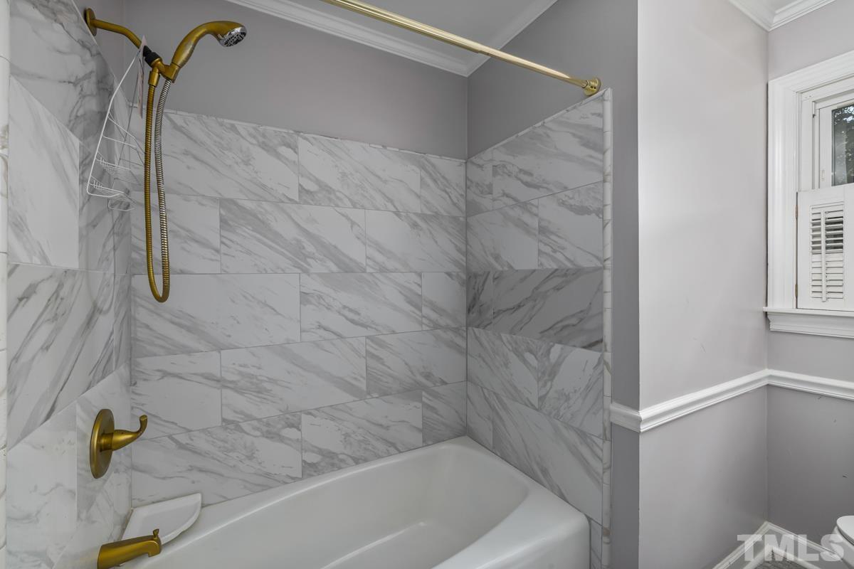 3708 Donna Road Raleigh, NC 27604 - Photo 19 of 33 a bathroom with a shower