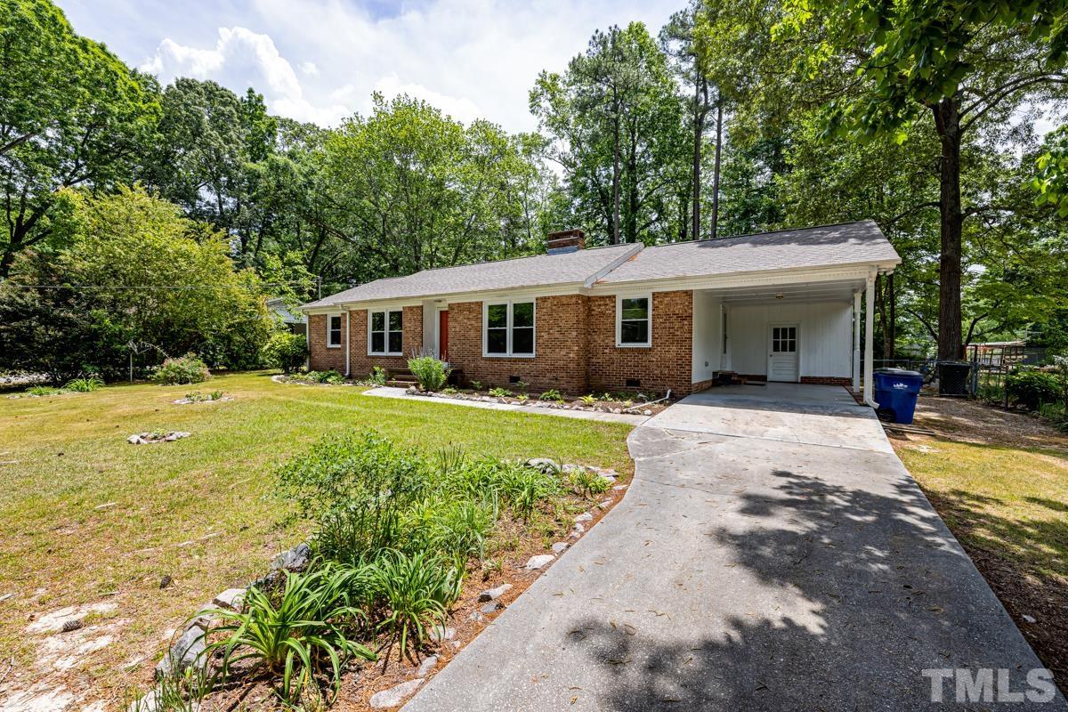 3708 Donna Road Raleigh, NC 27604 - Photo 3 of 33 a view of a house with a swimming pool
