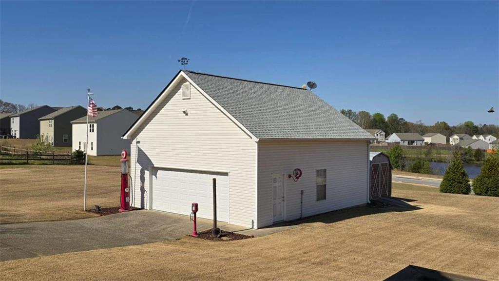 352 Olde Wick Trail Hoschton, GA 30548 - Photo 28 of 34 a view of a house with a terrace