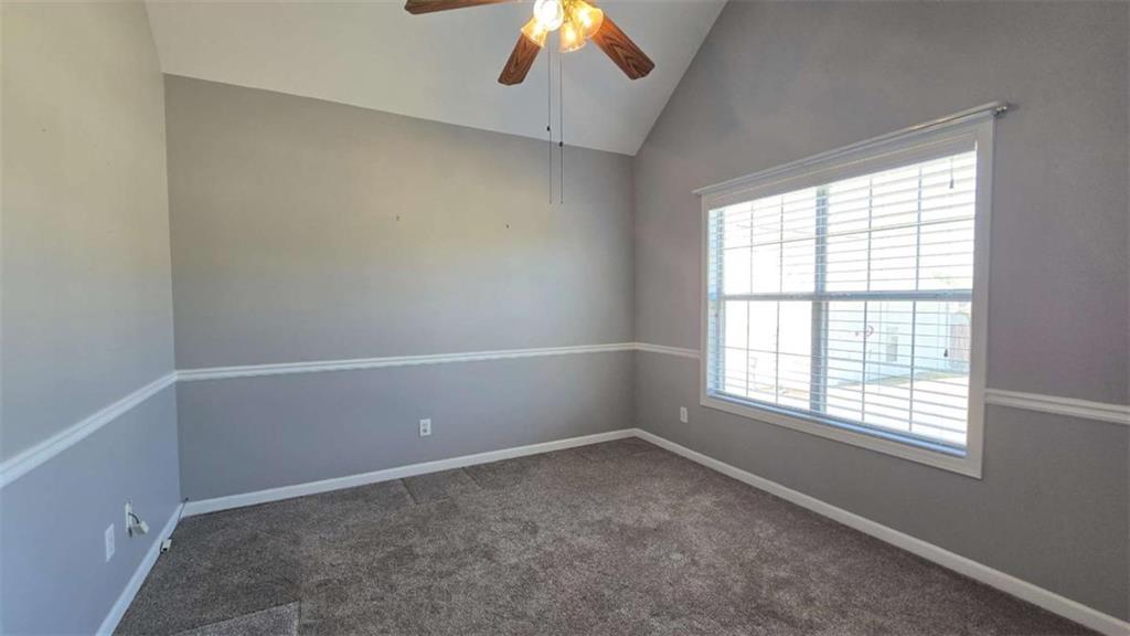352 Olde Wick Trail Hoschton, GA 30548 - Photo 9 of 34 an empty room with a window