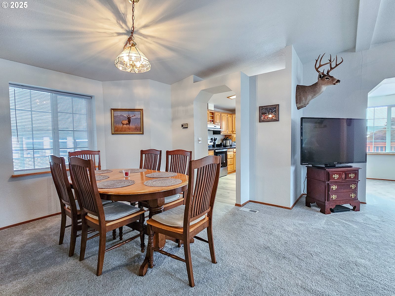 1509 Centennial Circle Forest Grove, OR 97116 - Photo 18 of 45 a view of a dining room with furniture