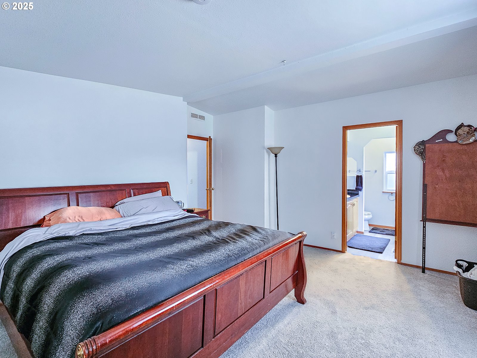 1509 Centennial Circle Forest Grove, OR 97116 - Photo 25 of 45 a bedroom with a bed and dresser