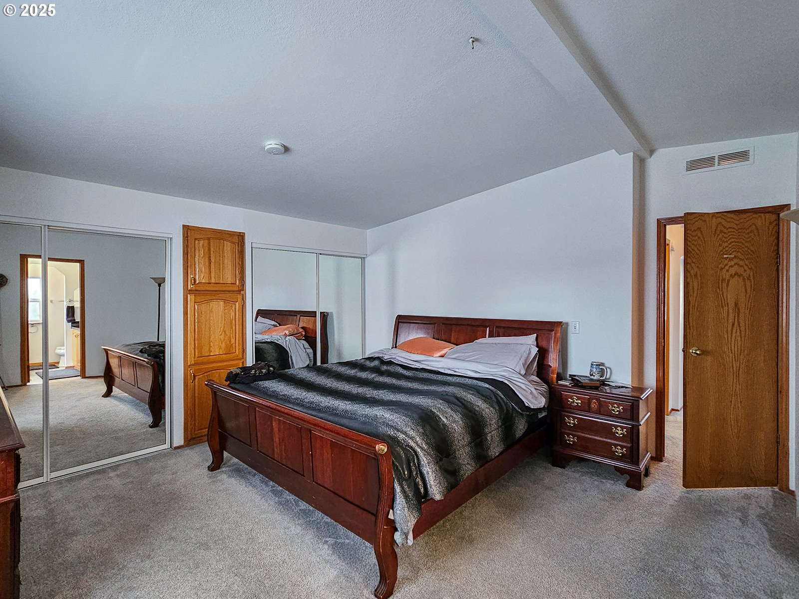 1509 Centennial Circle Forest Grove, OR 97116 - Photo 26 of 45 a bedroom with a bed and window