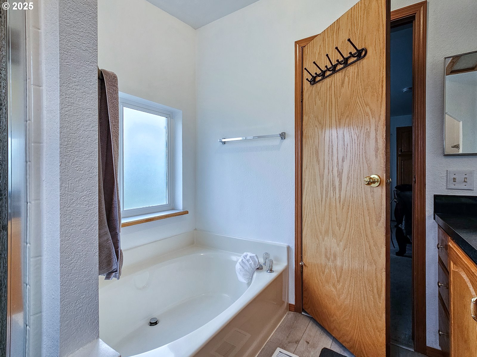 1509 Centennial Circle Forest Grove, OR 97116 - Photo 28 of 45 a bathroom with a tub and shower