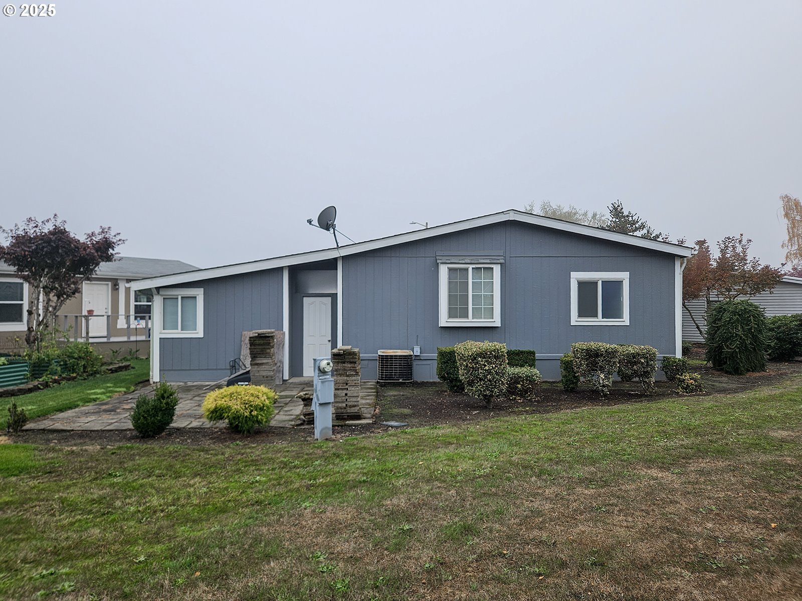 1509 Centennial Circle Forest Grove, OR 97116 - Photo 32 of 45 a backyard of a house with table and chairs