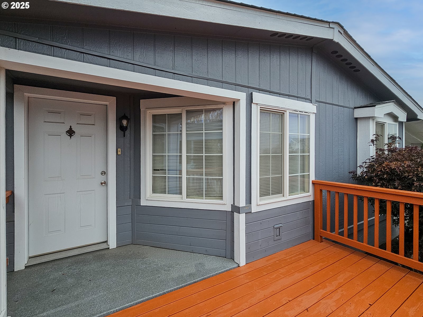 1509 Centennial Circle Forest Grove, OR 97116 - Photo 35 of 45 a view of a house with deck and wooden floor