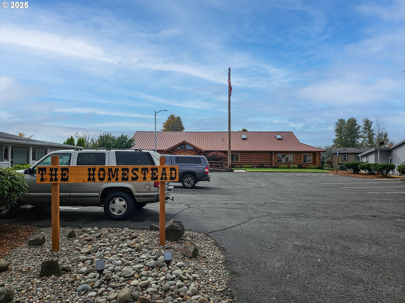 1509 Centennial Circle Forest Grove, OR 97116 - Photo 38 of 45 a wooden bench sitting in front of a building