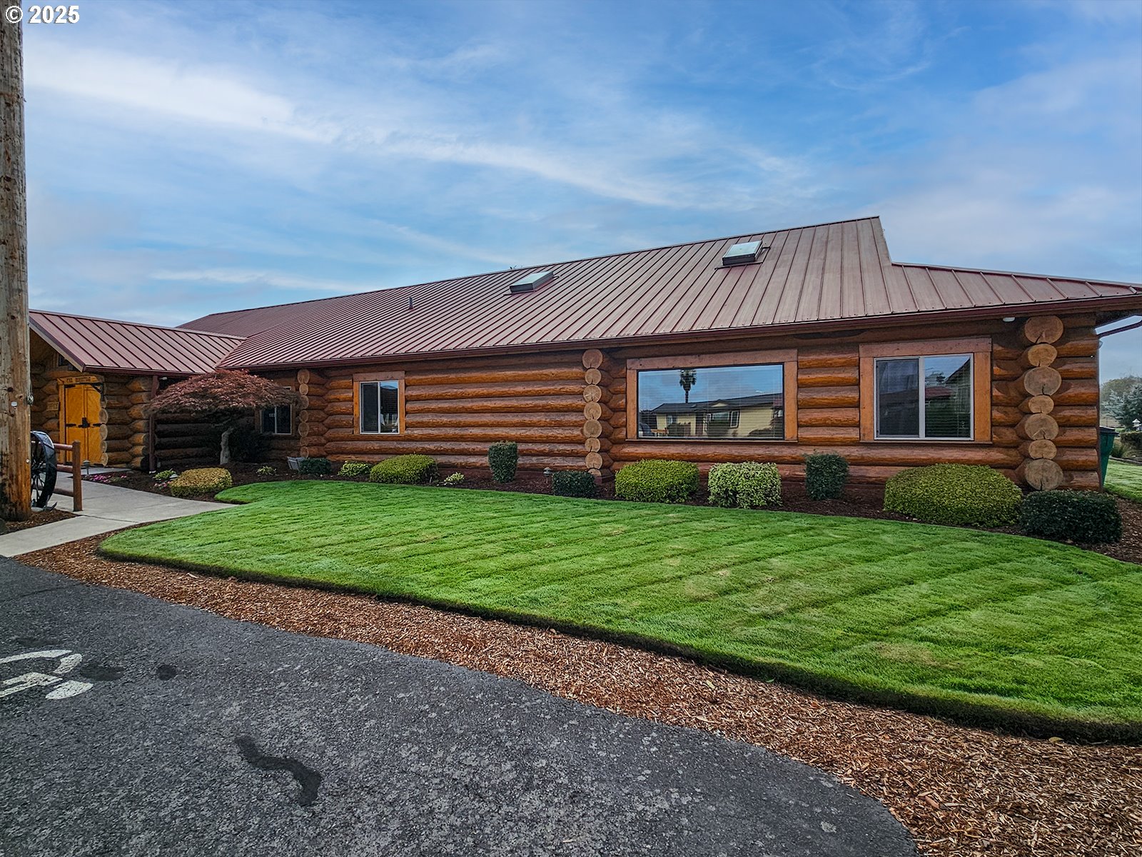 1509 Centennial Circle Forest Grove, OR 97116 - Photo 45 of 45 a front view of a house with a garden and plants