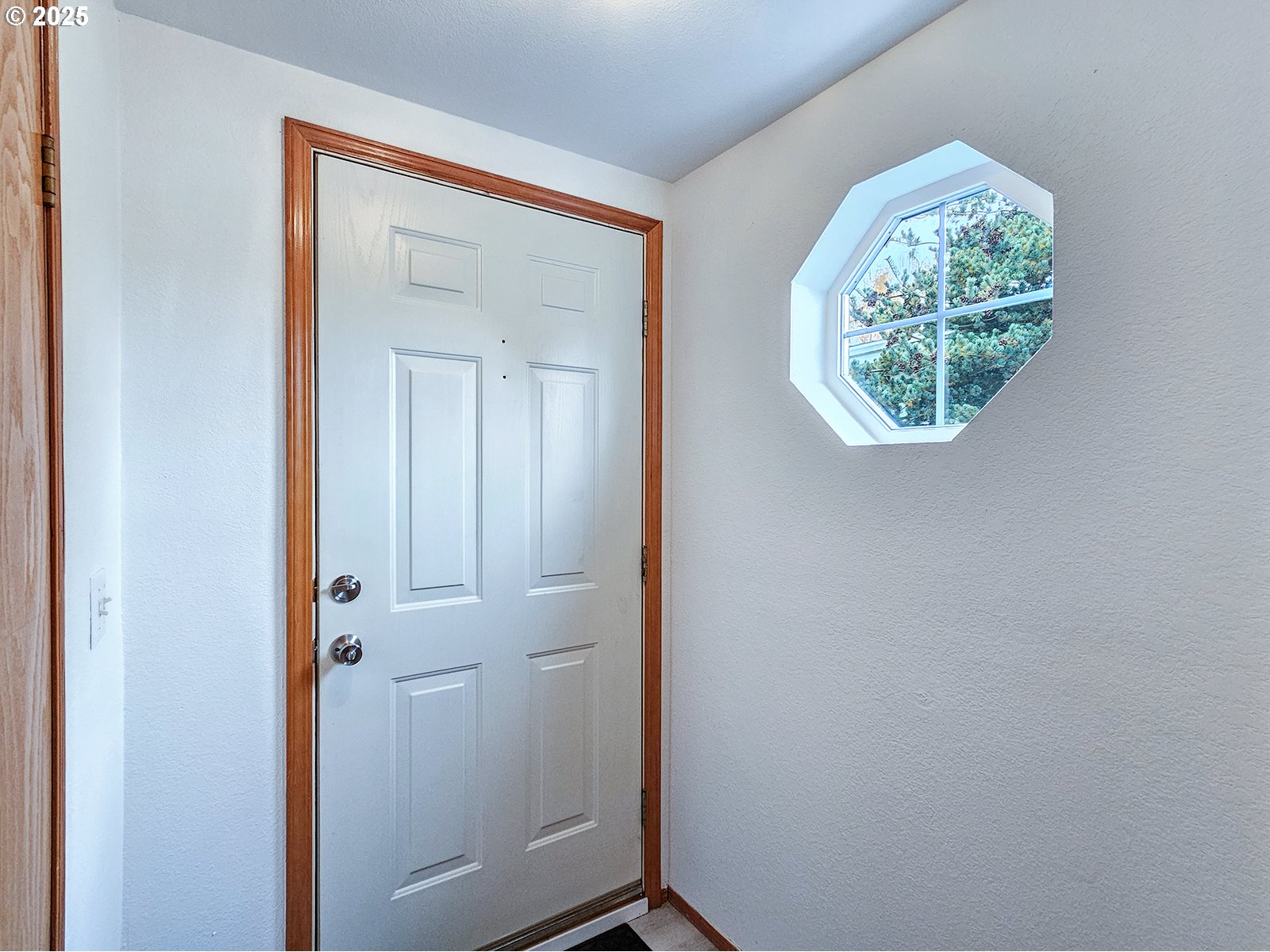 1509 Centennial Circle Forest Grove, OR 97116 - Photo 5 of 45 an entryway with a window