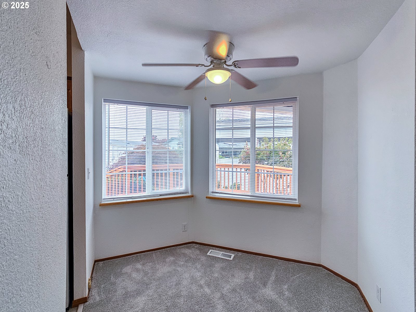 1509 Centennial Circle Forest Grove, OR 97116 - Photo 10 of 45 a view of an empty room with a window