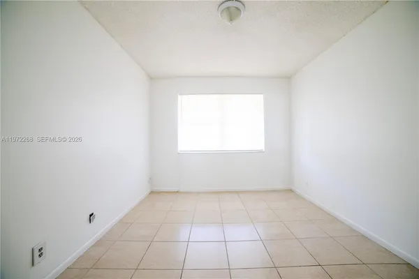 an empty room with a window