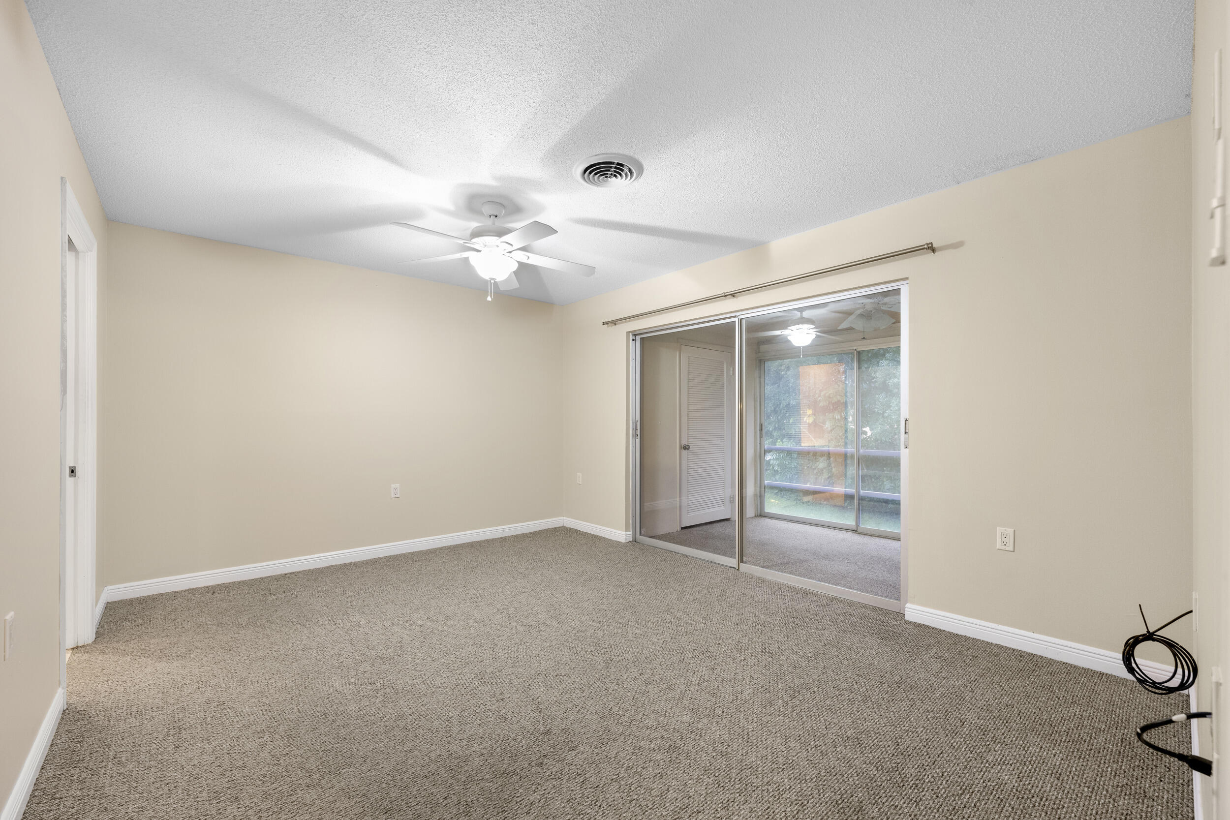 1900 South Kanner Highway, Unit 4204 Stuart, FL 34994 - Photo 14 of 26 a view of an empty room with a ceiling fan
