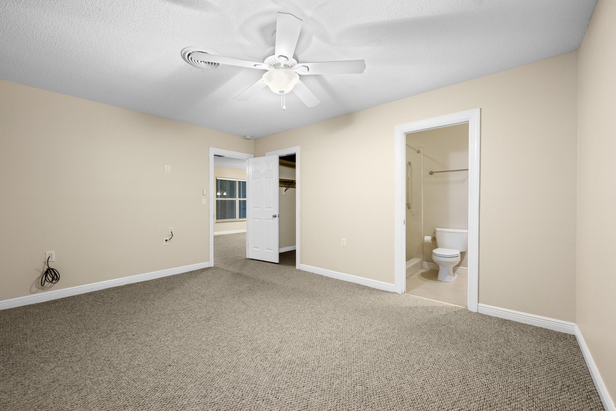 1900 South Kanner Highway, Unit 4204 Stuart, FL 34994 - Photo 16 of 26 a view of an empty room with a fan