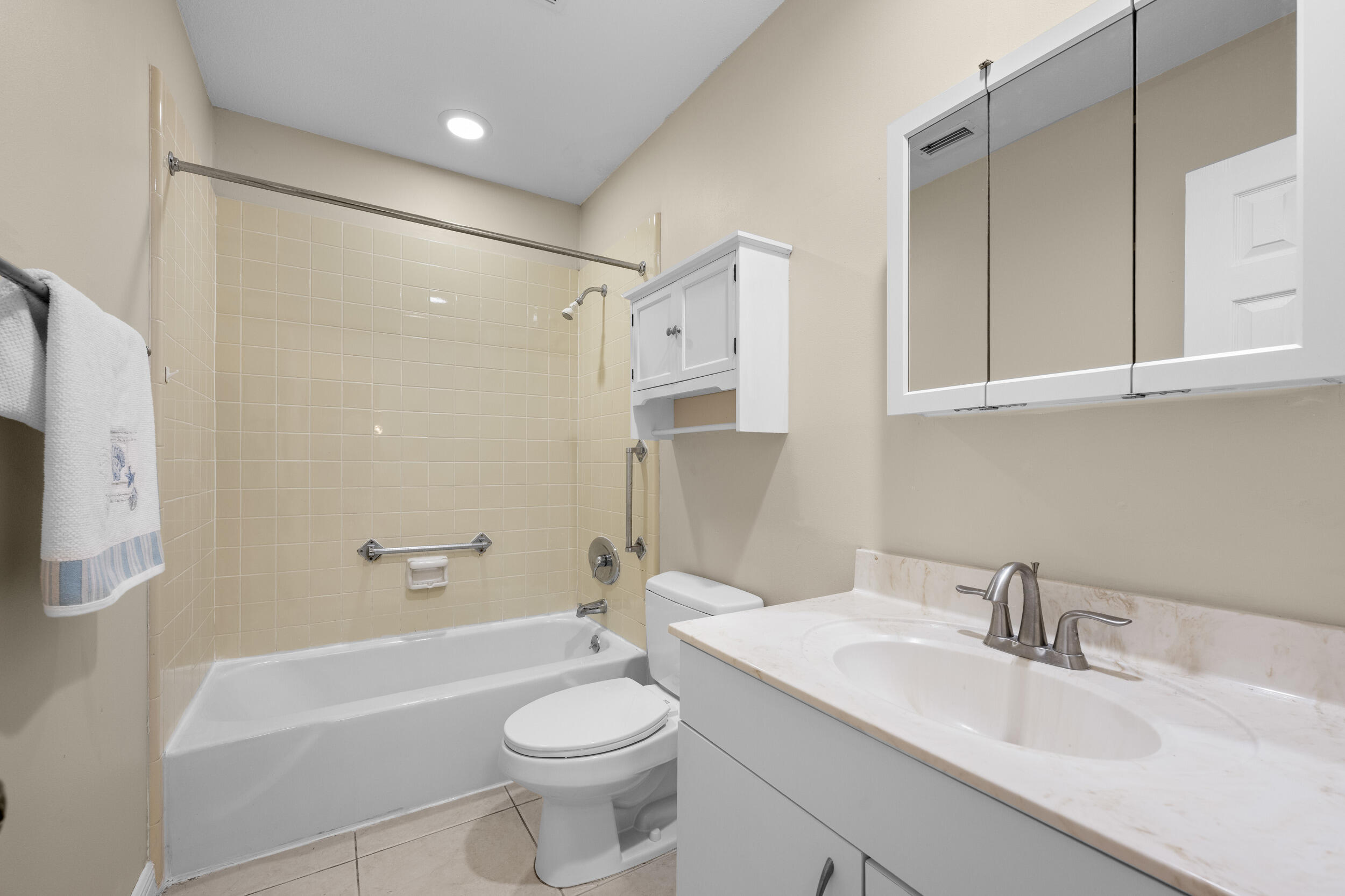 1900 South Kanner Highway, Unit 4204 Stuart, FL 34994 - Photo 23 of 26 a bathroom with a sink a toilet and shower