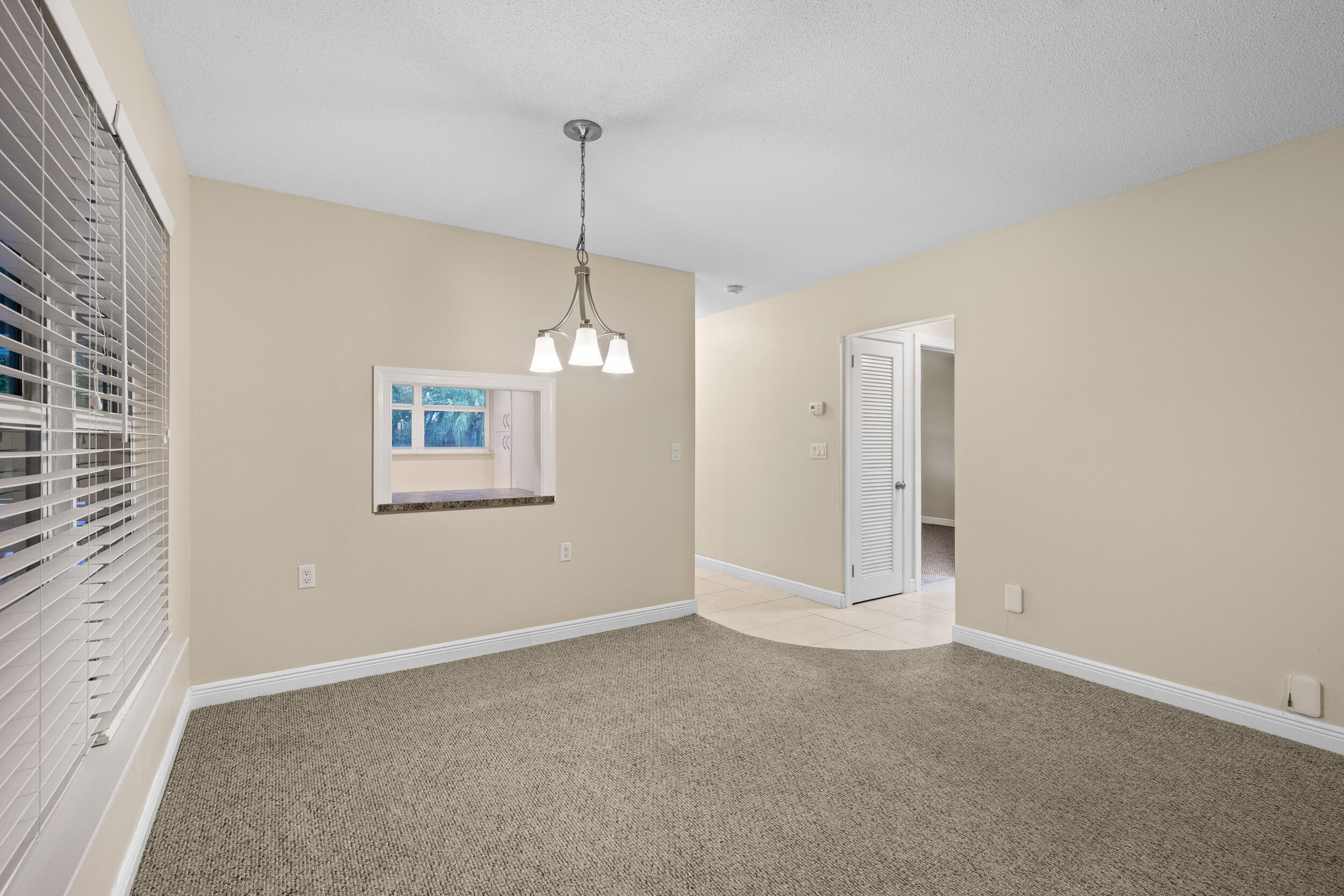 1900 South Kanner Highway, Unit 4204 Stuart, FL 34994 - Photo 8 of 26 a view of an empty room with a window