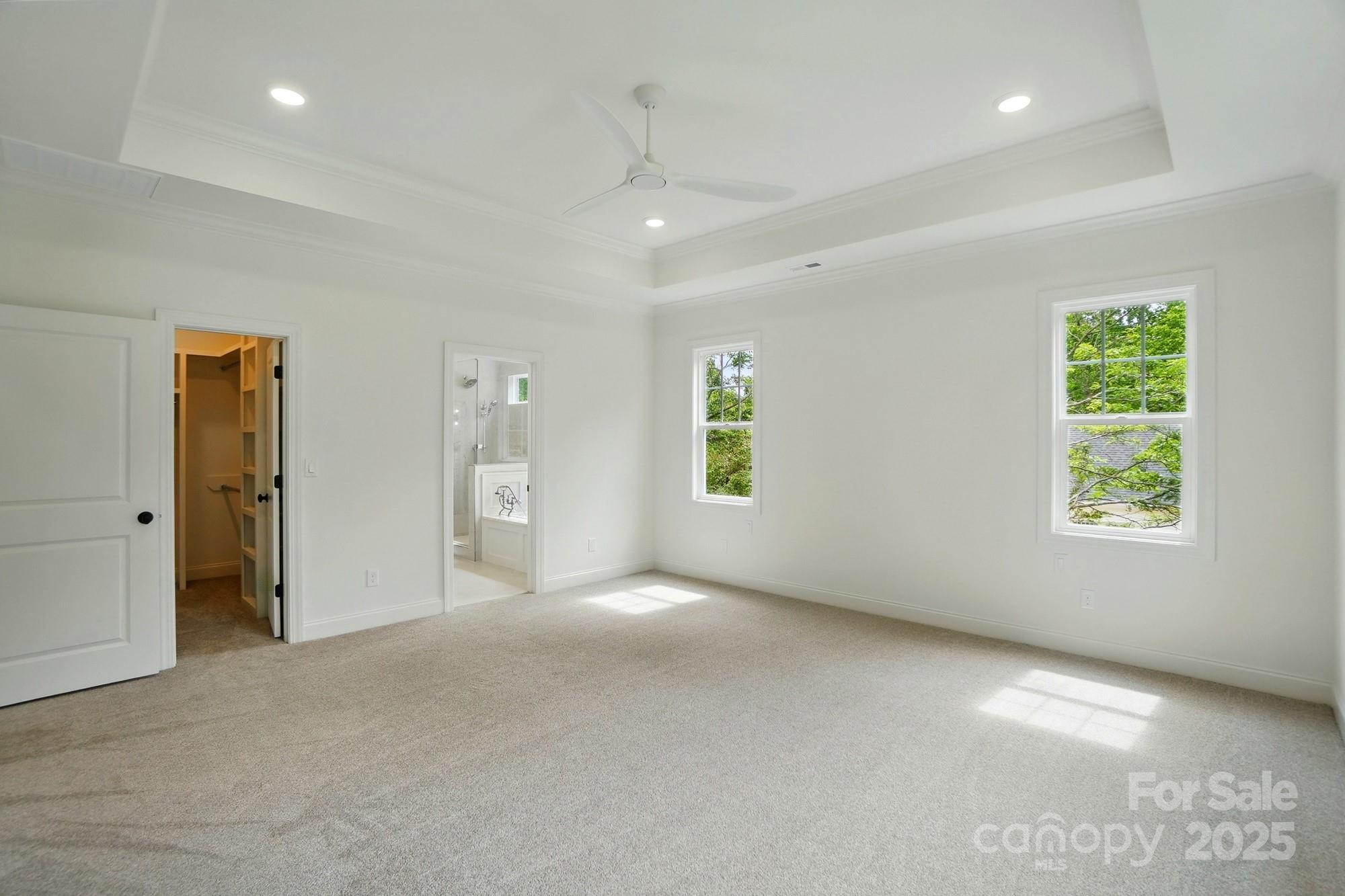 9315 Simpson Road Waxhaw, NC 28173 - Photo 28 of 45 an empty room with windows and closet