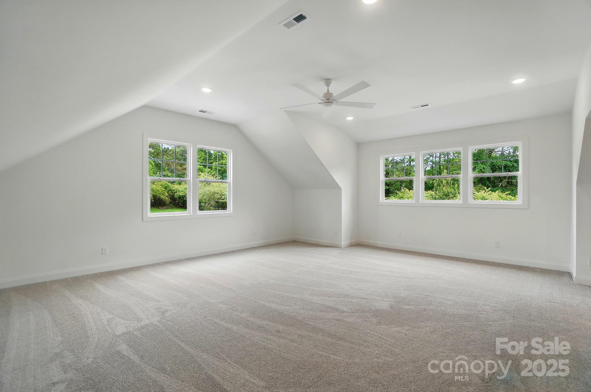9315 Simpson Road Waxhaw, NC 28173 - Photo 38 of 45 wooden floor in an empty room with a window