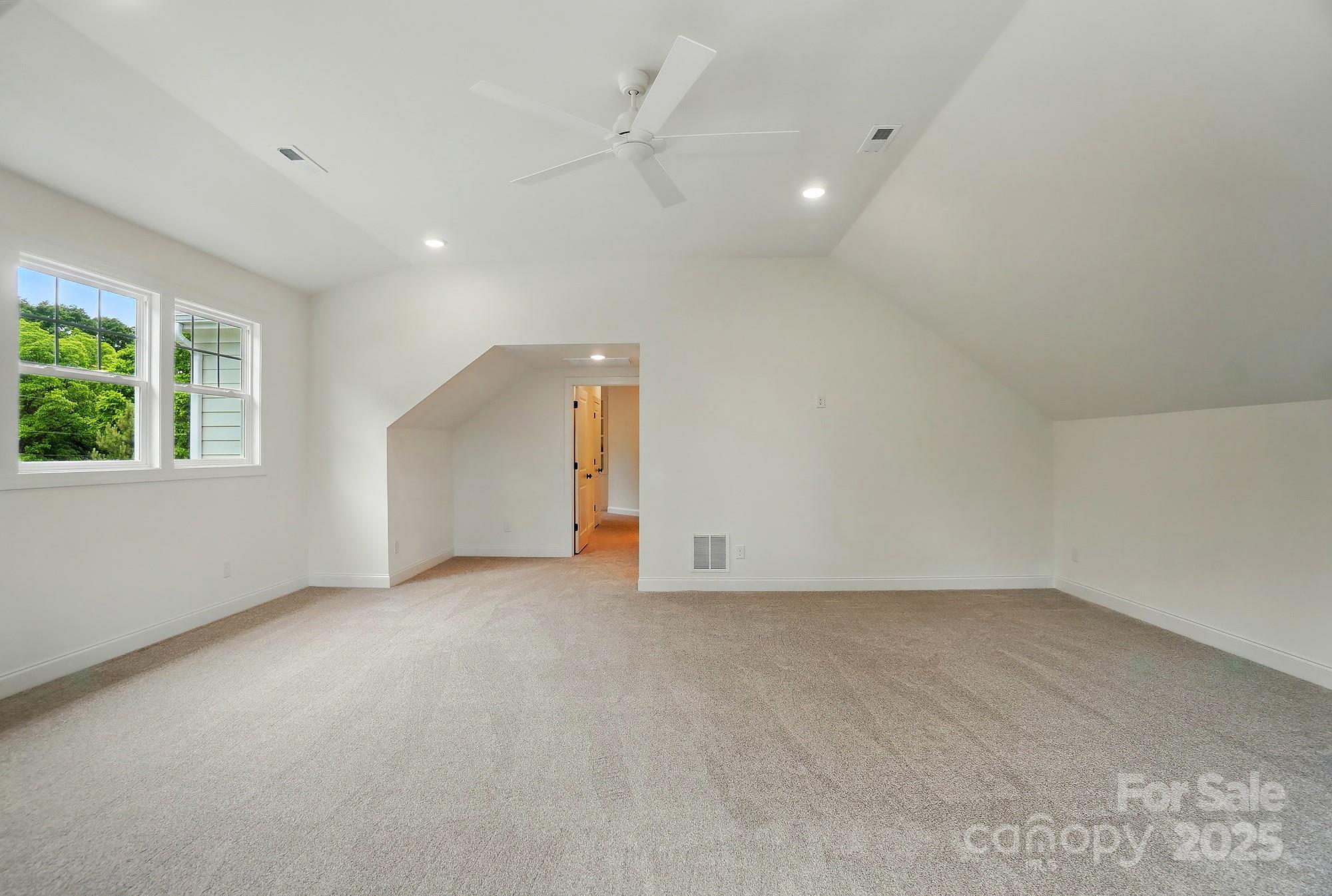 9315 Simpson Road Waxhaw, NC 28173 - Photo 39 of 45 an empty room with a empty space and windows
