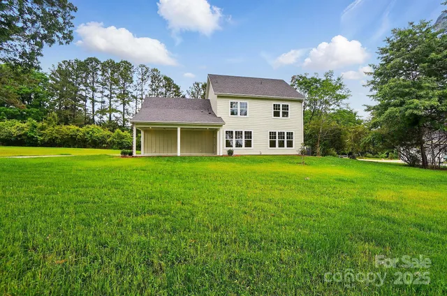 a house view with a garden space