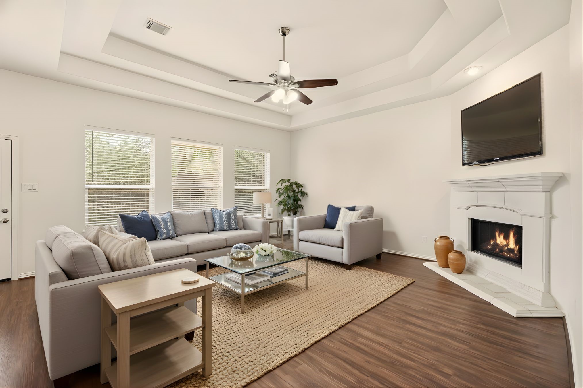 25207 Oak Star Drive Spring, TX 77389 - Photo 2 of 18 a living room with furniture fireplace and flat screen tv
