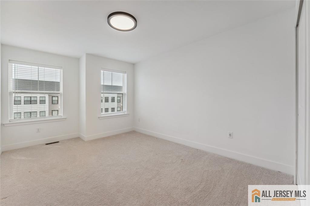 46 Mariveles Way Eatontown, NJ 07724 - Photo 17 of 26 an empty room with windows