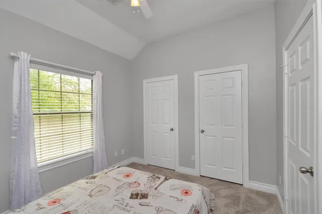 a view of bedroom with a window