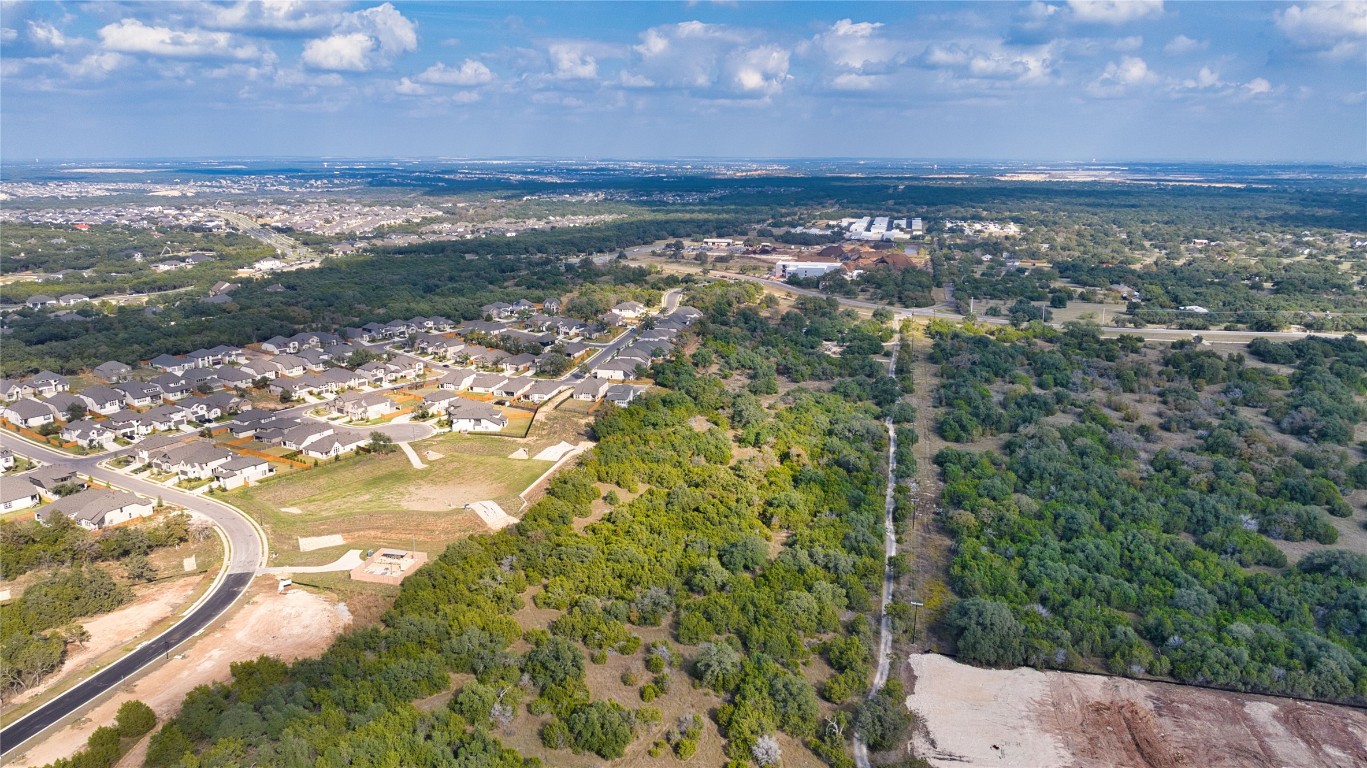 Tbd Whisper Lane Georgetown, TX 78628 - Photo 2 of 26 Aerial view of property's location with nearby suburban area