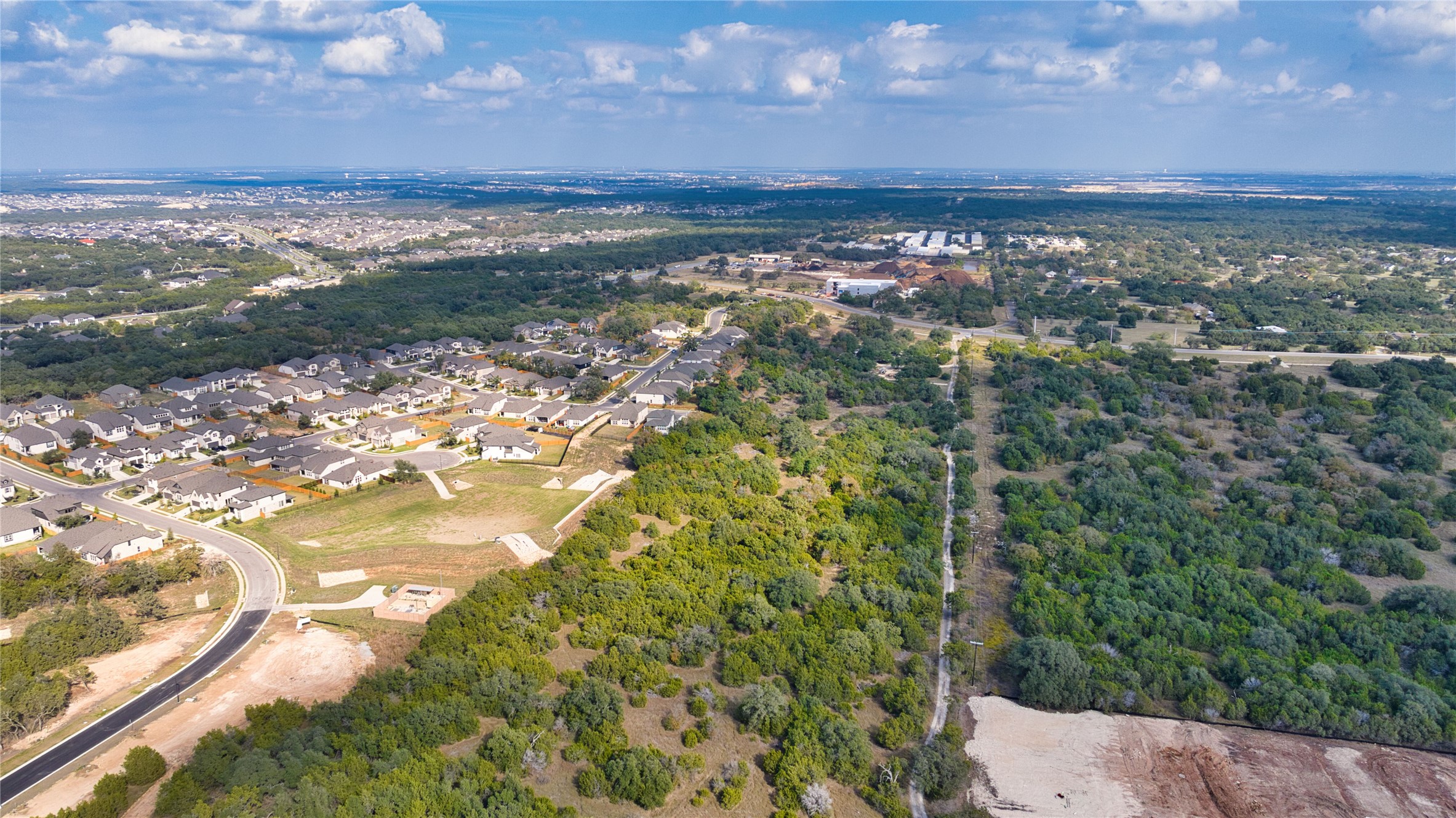 Tbd Whisper Lane Georgetown, TX 78628 - Photo 3 of 30 Aerial view of property's location with nearby suburban area