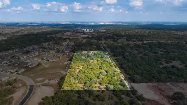 a view of a city with ocean view