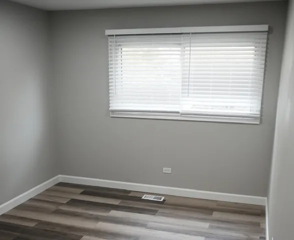 a view of a room that has a window